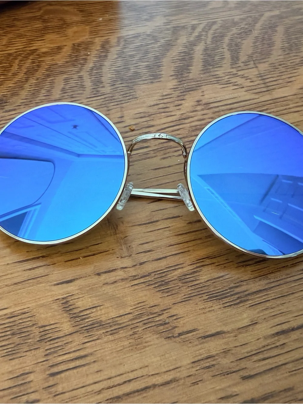 Illesteva Porto Cervo Round Silver Frame Sunglasses with Blue Mirrored Lenses
